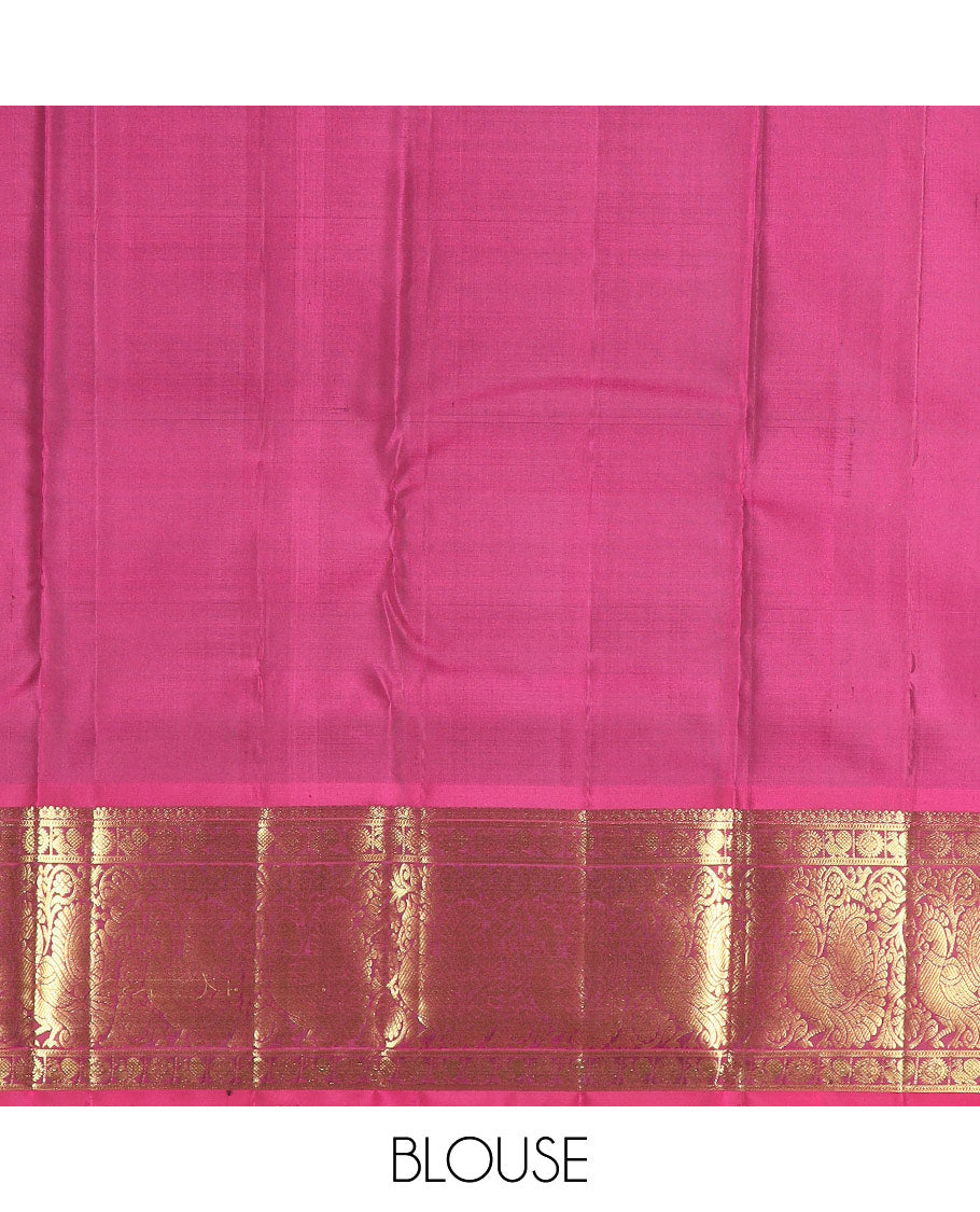 Blue chakram buttas Kanchipuram silk saree, contrast border of mayil chakram designs, and pallu steeped with chakram motifs