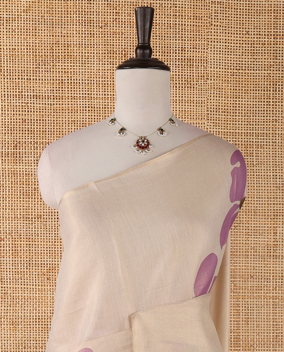 Borderless cream printed onam tissue silk saree features light lavender color five-petal flower & leaf motifs print, matching floral print blouse