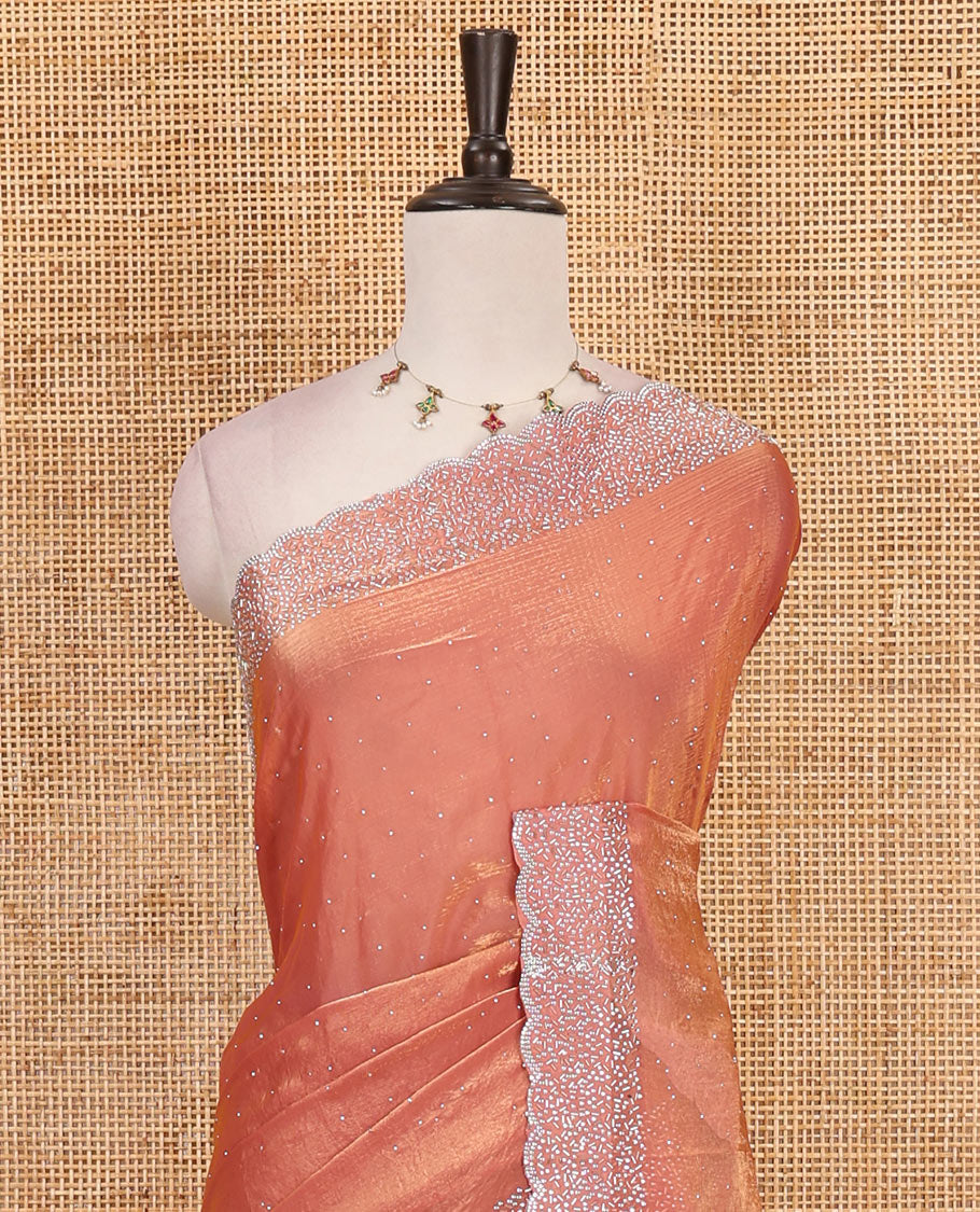 Onion Pink Swarovski crystal stone embedded fendy chiffon saree, scallop Swarovski stone embroidered border, and contrast plain blouse