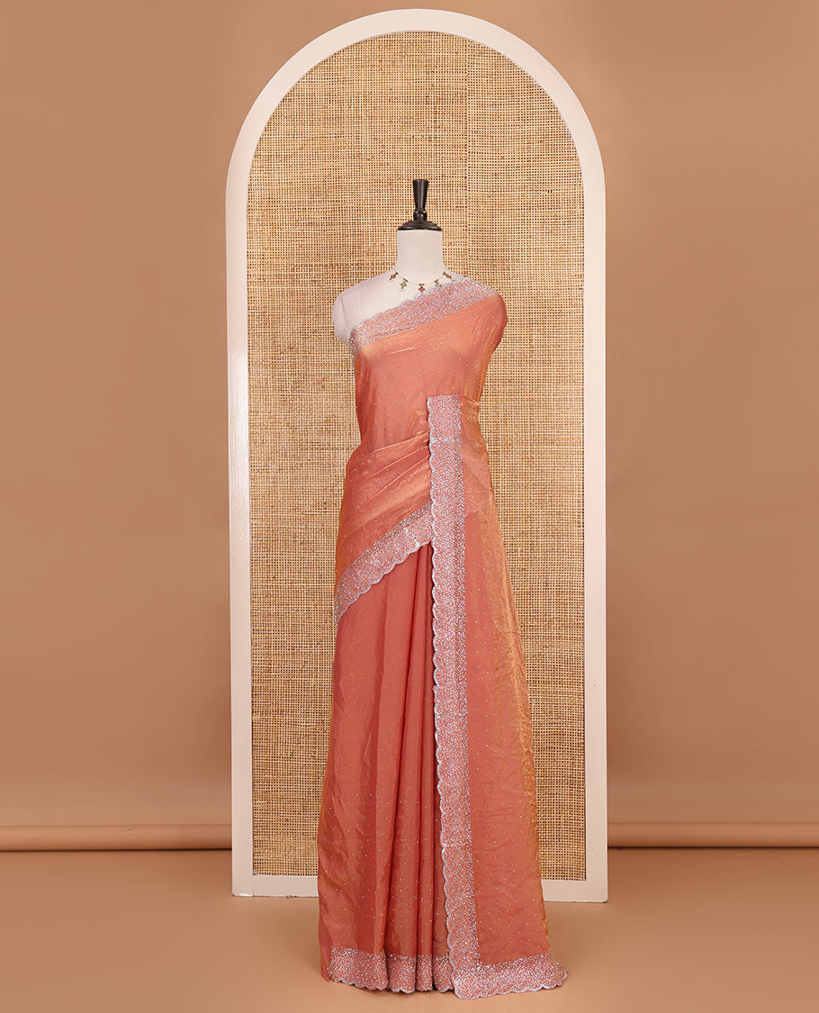 Onion Pink Swarovski crystal stone embedded fendy chiffon saree, scallop Swarovski stone embroidered border, and contrast plain blouse