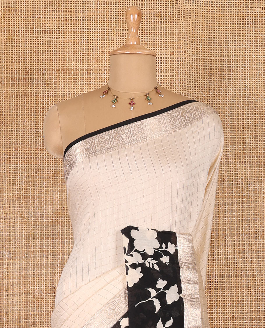 Cream gold zari checked Assam cotton saree, contrast zari border of floral vine print, zari striped pallu, and a matching blouse