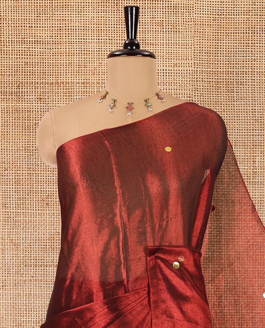 Borderless maroon mirror work khadi tissue saree, mirror work pallu, and a matching blouse