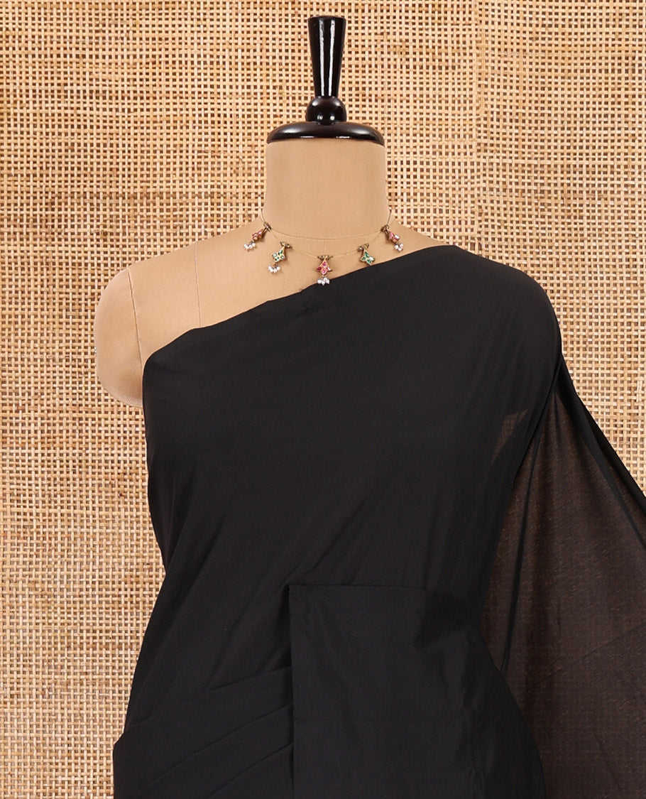 Borderless black butterfly motifs patch embroidered South cotton saree, butterfly motifs embroidered pallu, and a contrast block printed blouse