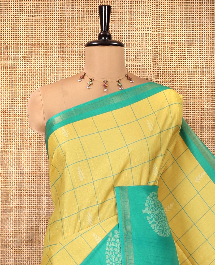 Yellow Katan Silk Saree, Embellished with Butta Enclosed Checks on Its Body, Complemented by a Contrast Border of Tree Motifs, Jaal Pallu, and Paired with a Contrast Blouse