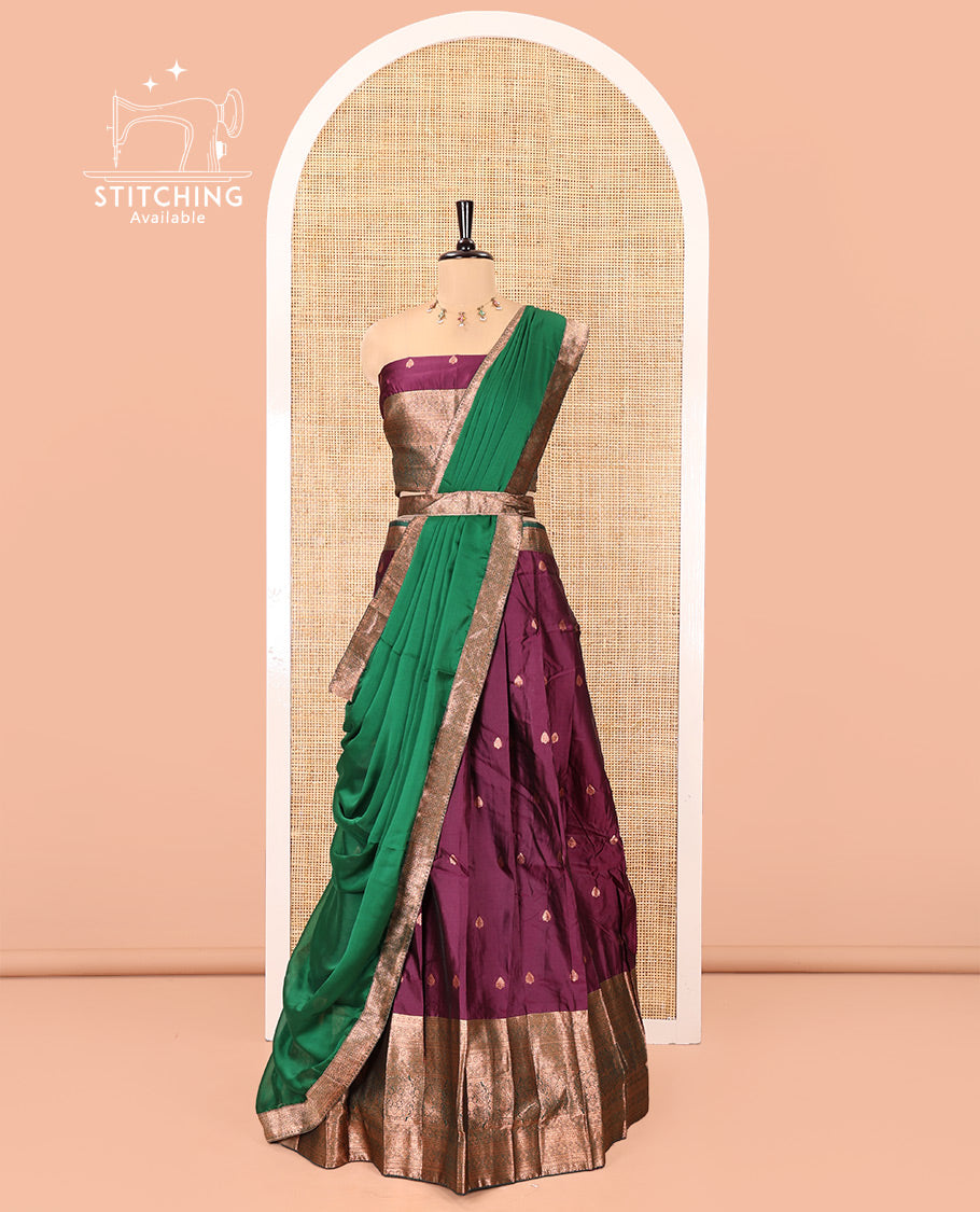 Dark Magenta-Green Semi-Banarasi Half-Saree Features Buttas Skirt,Contrast Traditional Zari Border, a Matching Blouse, and a Contrast Satin Georgette Dhavani