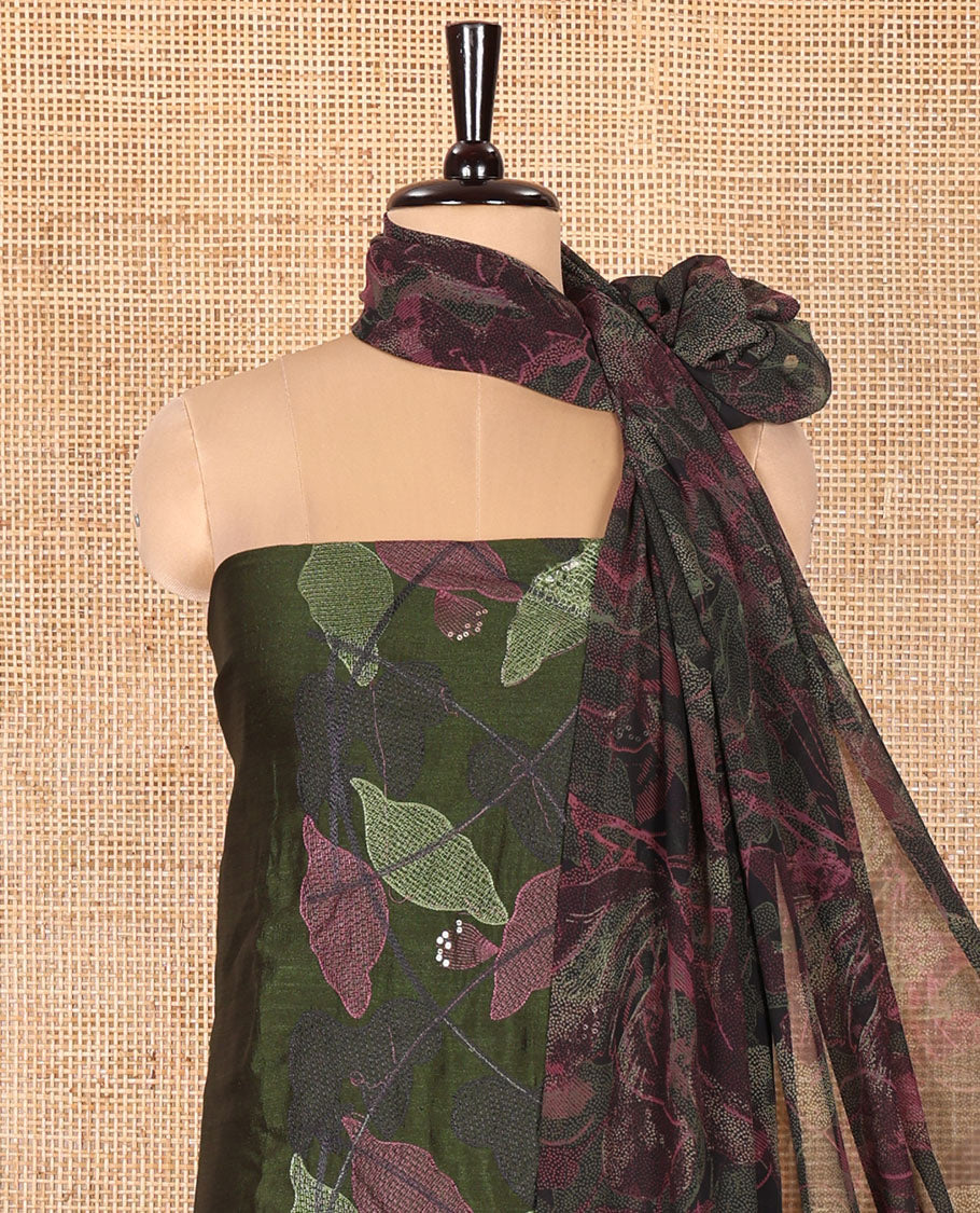 Green Vichitra Silk Designer Material Chudidar Set, Beautiful Bedecked with Floral Cross-Stiched Embroidered Top, A Subtly Plain Santoon Bottom, and Paired with a Georgette Abstract Printed Dupatta