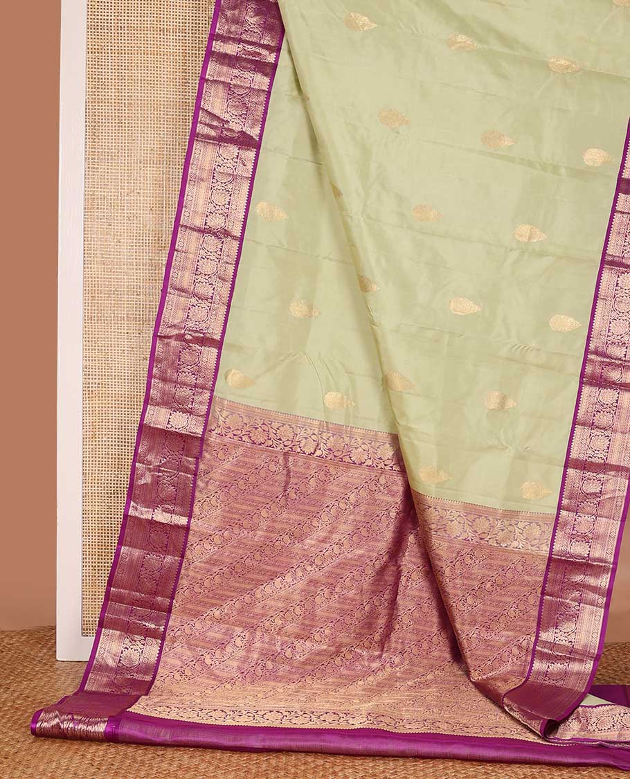 Sandal zari buttas silk saree, contrast border of thilakam, jada nagam, neli and kodi visiry and pallu of diagonally woven kodi manga and geometric designs