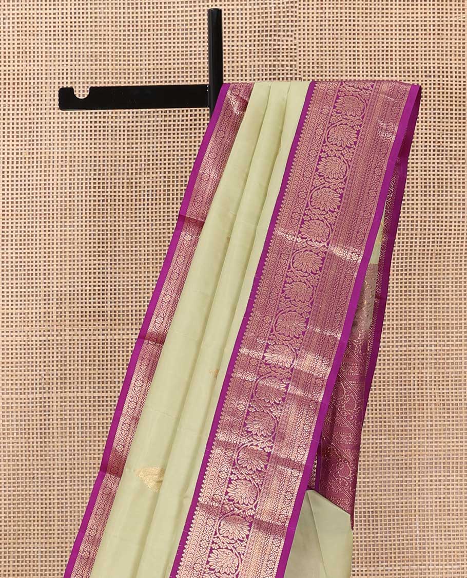 Sandal zari buttas silk saree, contrast border of thilakam, jada nagam, neli and kodi visiry and pallu of diagonally woven kodi manga and geometric designs