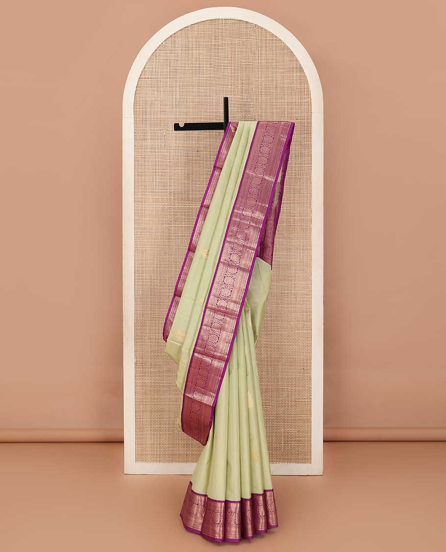 Sandal zari buttas silk saree, contrast border of thilakam, jada nagam, neli and kodi visiry and pallu of diagonally woven kodi manga and geometric designs