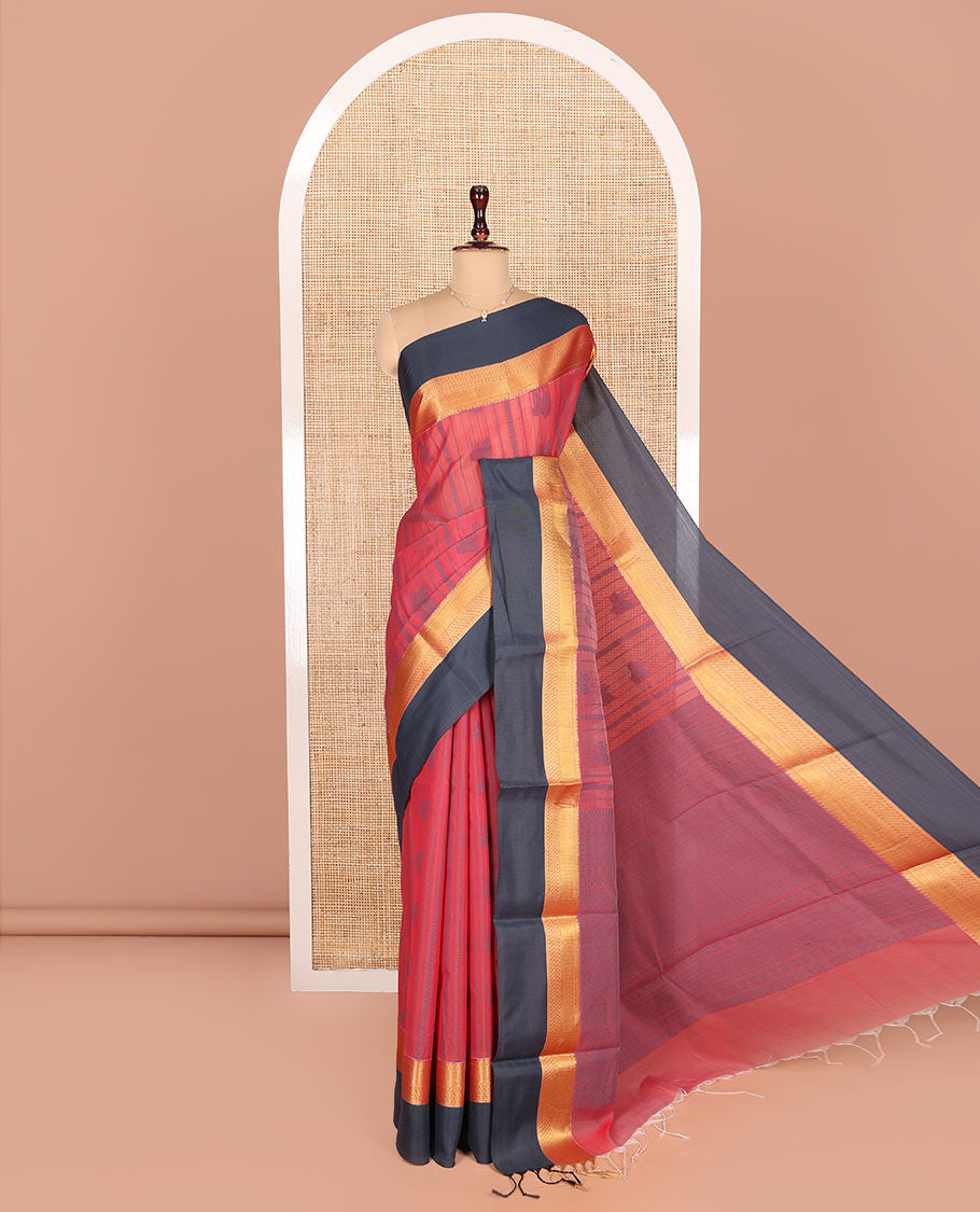 Red Semi-Silk Cotton Saree, Sparsely Woven with Buttas and Stripes All Over Its Body, Complemented by a Contrast Border of Traditional Zari Designs, Pallu of Jaal Designs, and Paired with a Matching Blouse