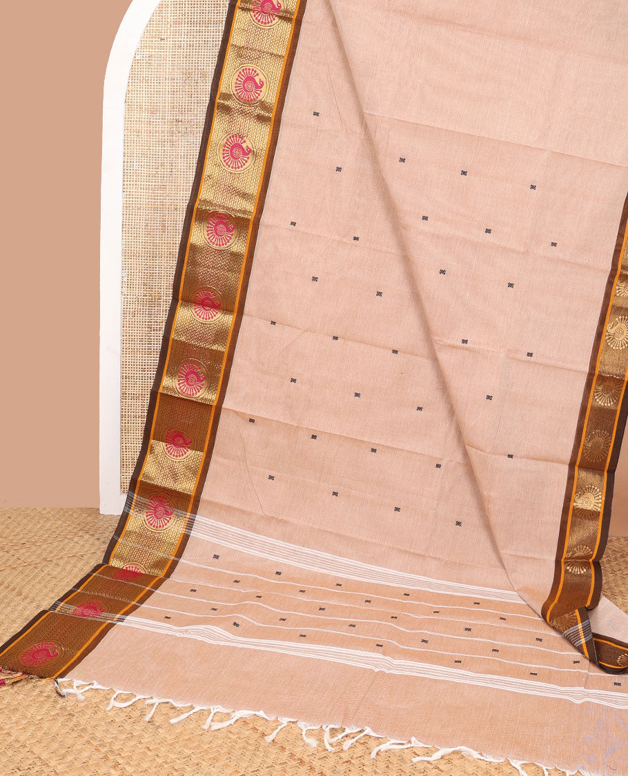 Beige motifs chettinad cotton saree with contrast peacock design border & striped, floral design pallu