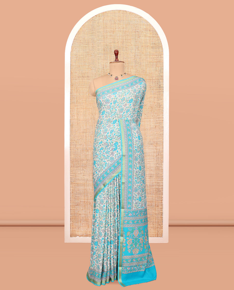 Off White Printed Silk Saree, Spotlighted with Floral-Vine Print, a Contrast Traditional Zari Border, Floral Pallu, and a Contrast Blouse