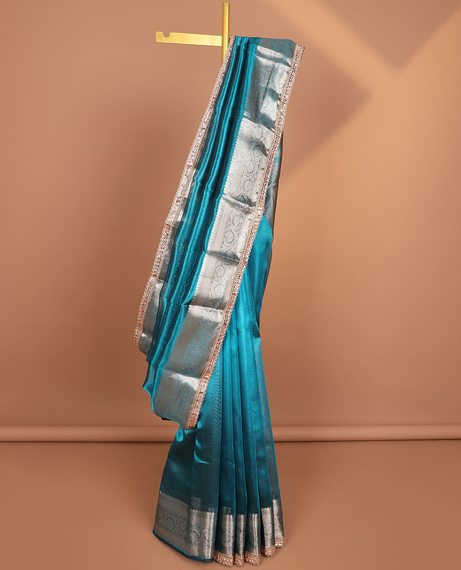 Blue tissue saree with self zari design border & intricate zari design pallu