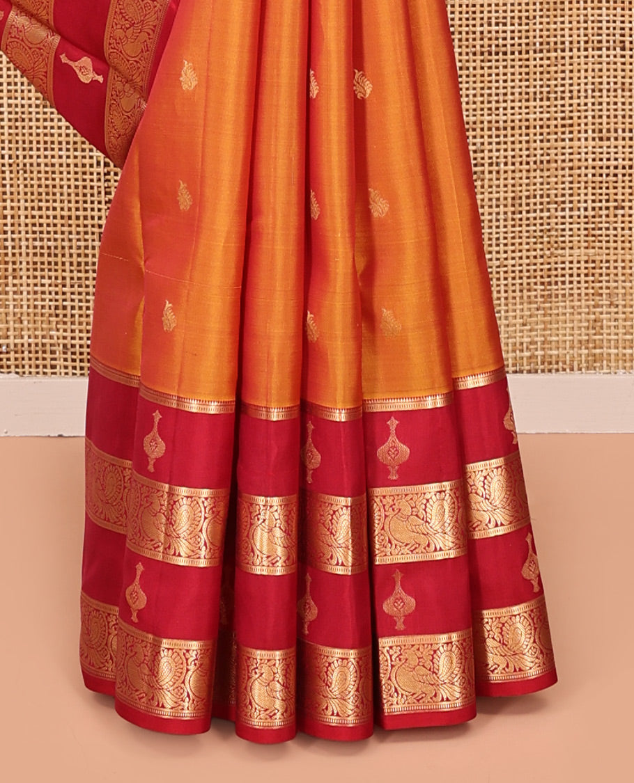 Orange Vasundhara Silk Mix Saree, Richly Woven with Zari Buttas All Over Its Body, Complemented by Contrast Border of Peacock Designs, Grand Jaal Pallu, and Paired with a Contrast Blouse