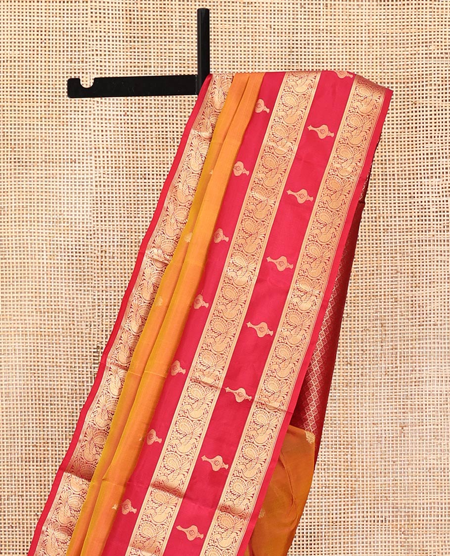 Orange Vasundhara Silk Mix Saree, Richly Woven with Zari Buttas All Over Its Body, Complemented by Contrast Border of Peacock Designs, Grand Jaal Pallu, and Paired with a Contrast Blouse