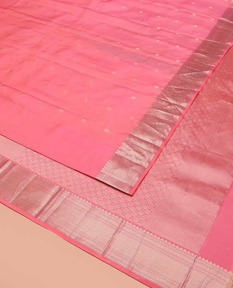 Pink Vasundhara Silk Saree Decked Up with Zari Buttas All Over Its Body, Complemented by Zari Border of Thilakam, and Jaal Designs, Subtly Woven Pallu of Circle Motifs, and Paired with a Matching Blouse