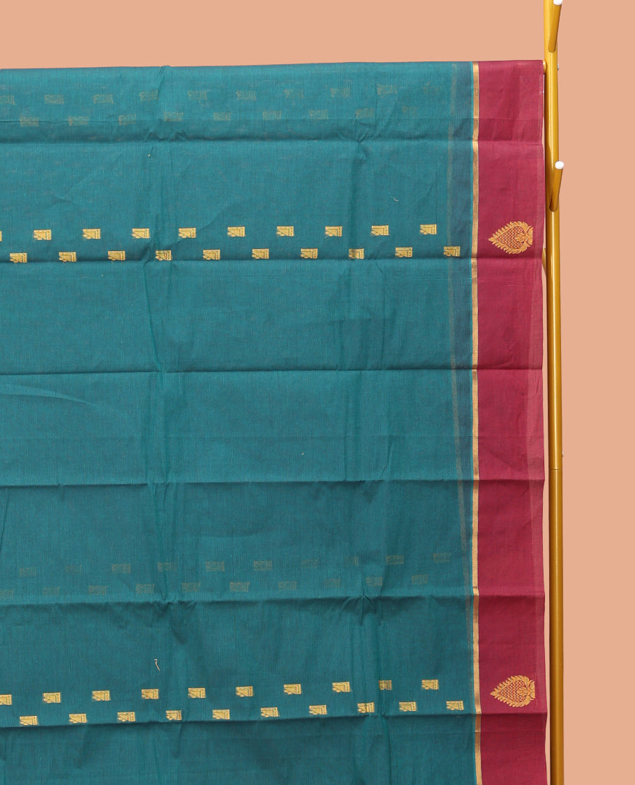 Blue Kanchi Cotton Saree, Accentuated with Buttas, Contrast Unique Motifs Woven Border, Pallu of Jaal Design, and a Matching Blouse