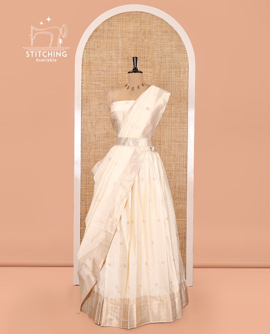 Cream Semi-Banarasi Half-Saree Featuring Zari Buttas Skirt, Traditional Zari Border, Matching Blouse, Zari Buttas Dhavani