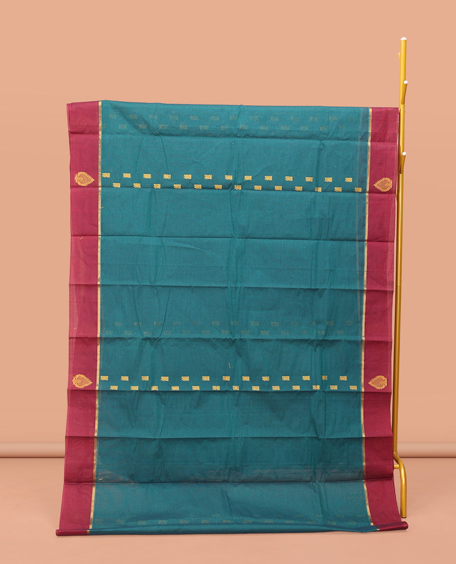 Blue Kanchi Cotton Saree, Accentuated with Buttas, Contrast Unique Motifs Woven Border, Pallu of Jaal Design, and a Matching Blouse