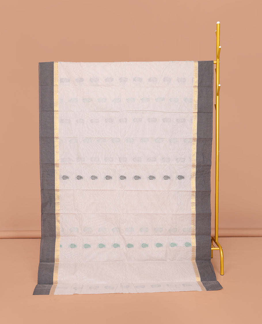 Off-White Kanchi Cotton Saree, Decked Up with Buttas All Over Its Body, Complemented by a Contrast Border, Pallu of Paisley Designs, and Paired with a Matching Blouse