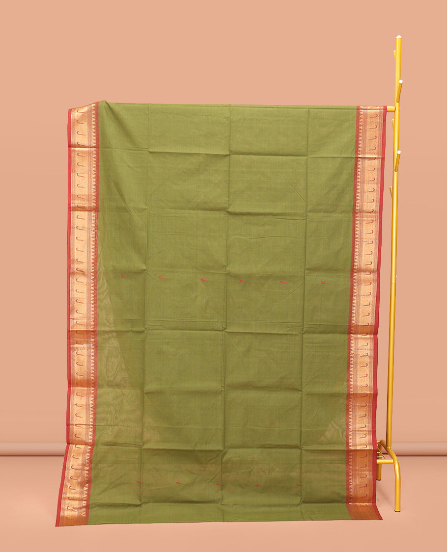 Green Chettinad Cotton Saree, Steeped with Muniya Buttas On Its Body, Complemented by a Contrast Traditional Muniya Border, Pallu of Stripes, and Paired with a Matching Blouse