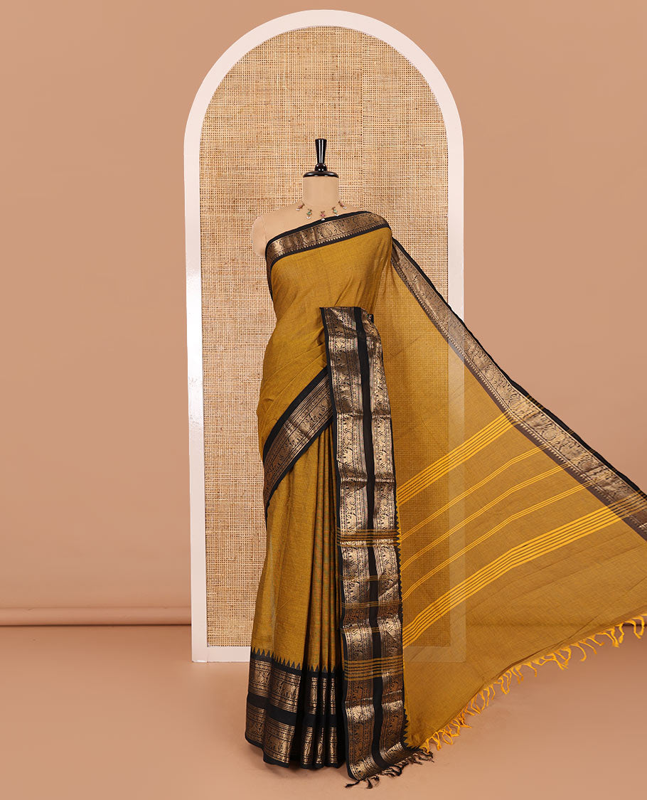 Gold plain chettinad cotton saree, contrast traditional zari temple rettai pettu border, striped pallu, and a matching blouse