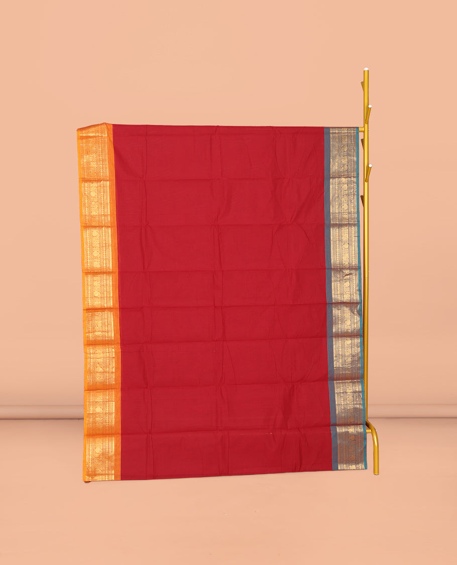 Red Plain Chettinad Cotton Saree, Complemented by Contrast Traditional Zari Design Ganga-Jamuna Border, Subtly Striped Pallu, and Paired with Matching Blouse