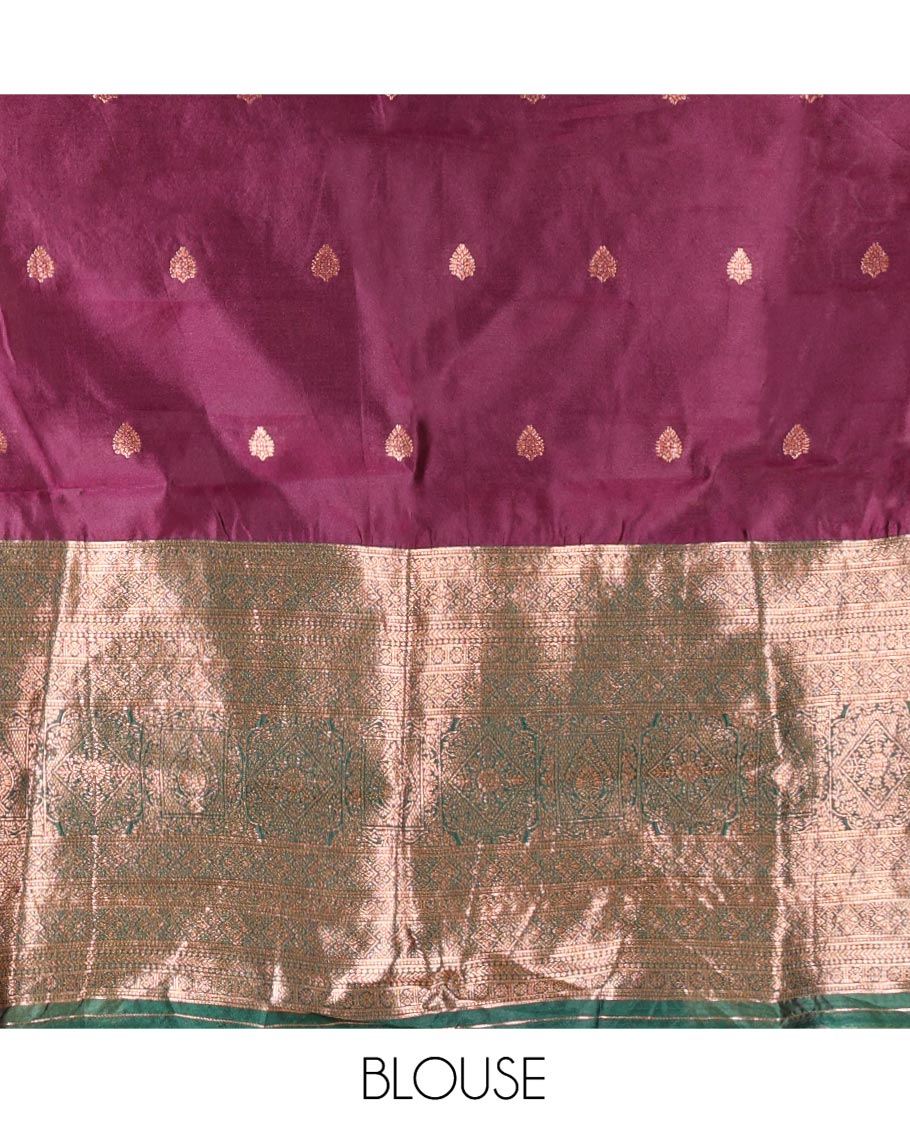 Dark Magenta-Green Semi-Banarasi Half-Saree Features Buttas Skirt,Contrast Traditional Zari Border, a Matching Blouse, and a Contrast Satin Georgette Dhavani