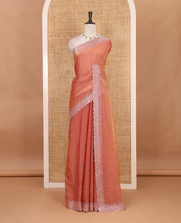 Onion Pink Swarovski crystal stone embedded fendy chiffon saree, scallop Swarovski stone embroidered border, and contrast plain blouse