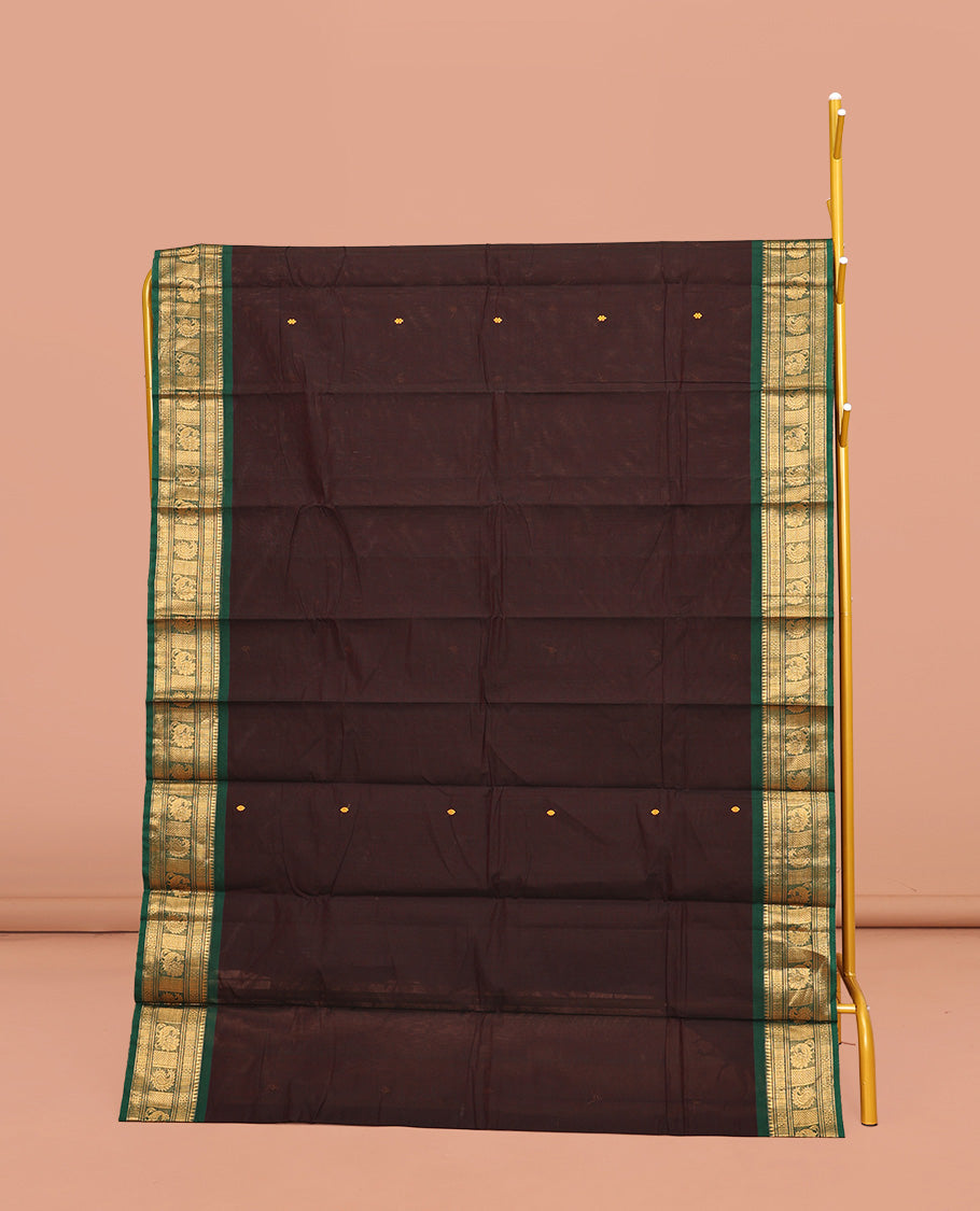 Brown Chettinad Cotton Saree, Adorned with Buttas All Over Its Body, Complemented by a Contrasting Traditional Zari Design Border, a Pallu of Stripes, and Paired with a Matching Blouse