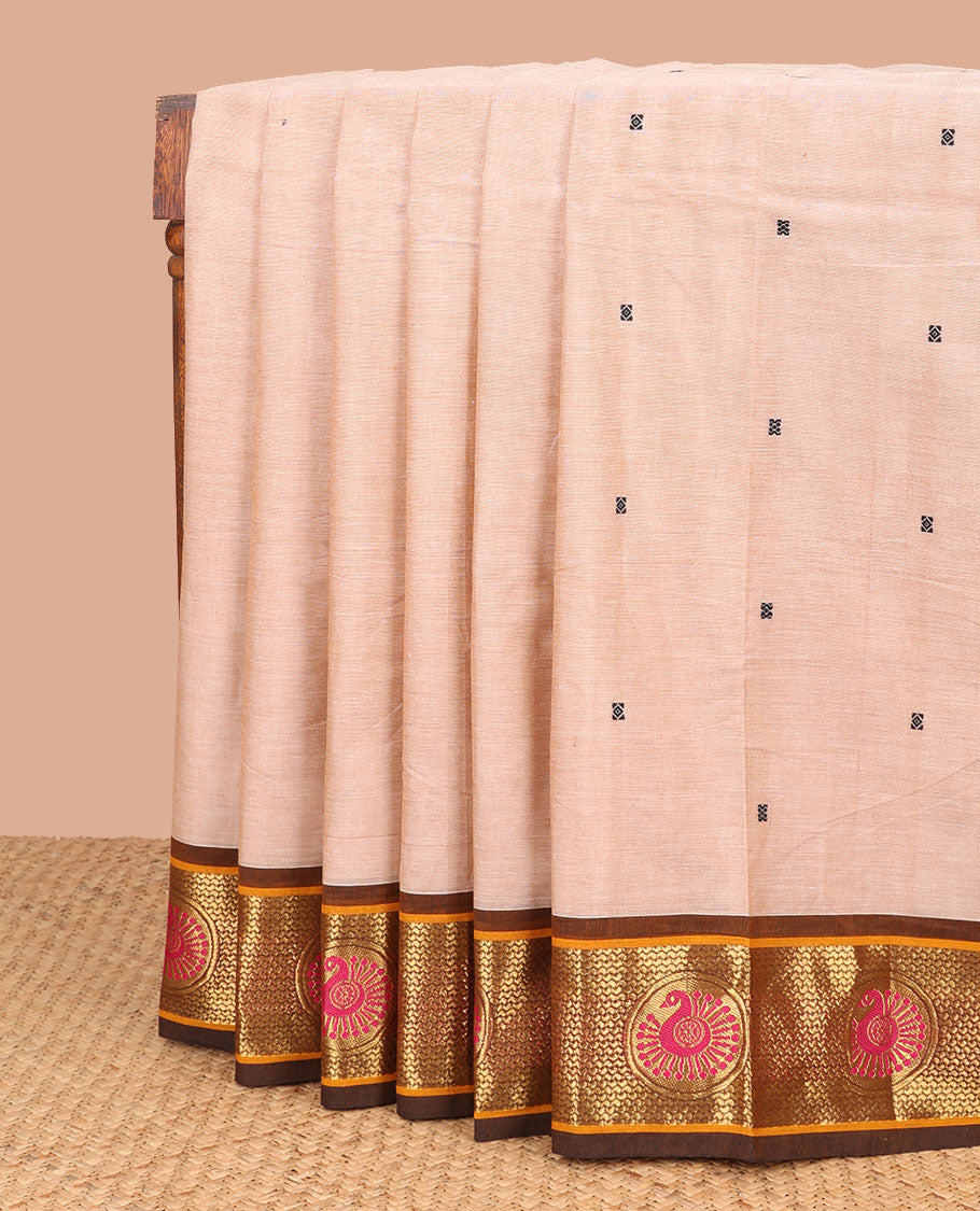 Beige motifs chettinad cotton saree with contrast peacock design border & striped, floral design pallu