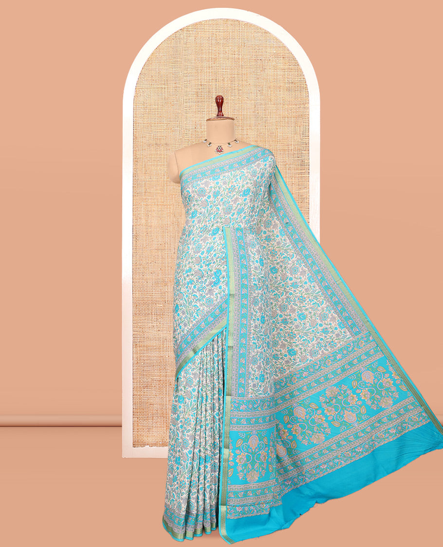 Off White Printed Silk Saree, Spotlighted with Floral-Vine Print, a Contrast Traditional Zari Border, Floral Pallu, and a Contrast Blouse