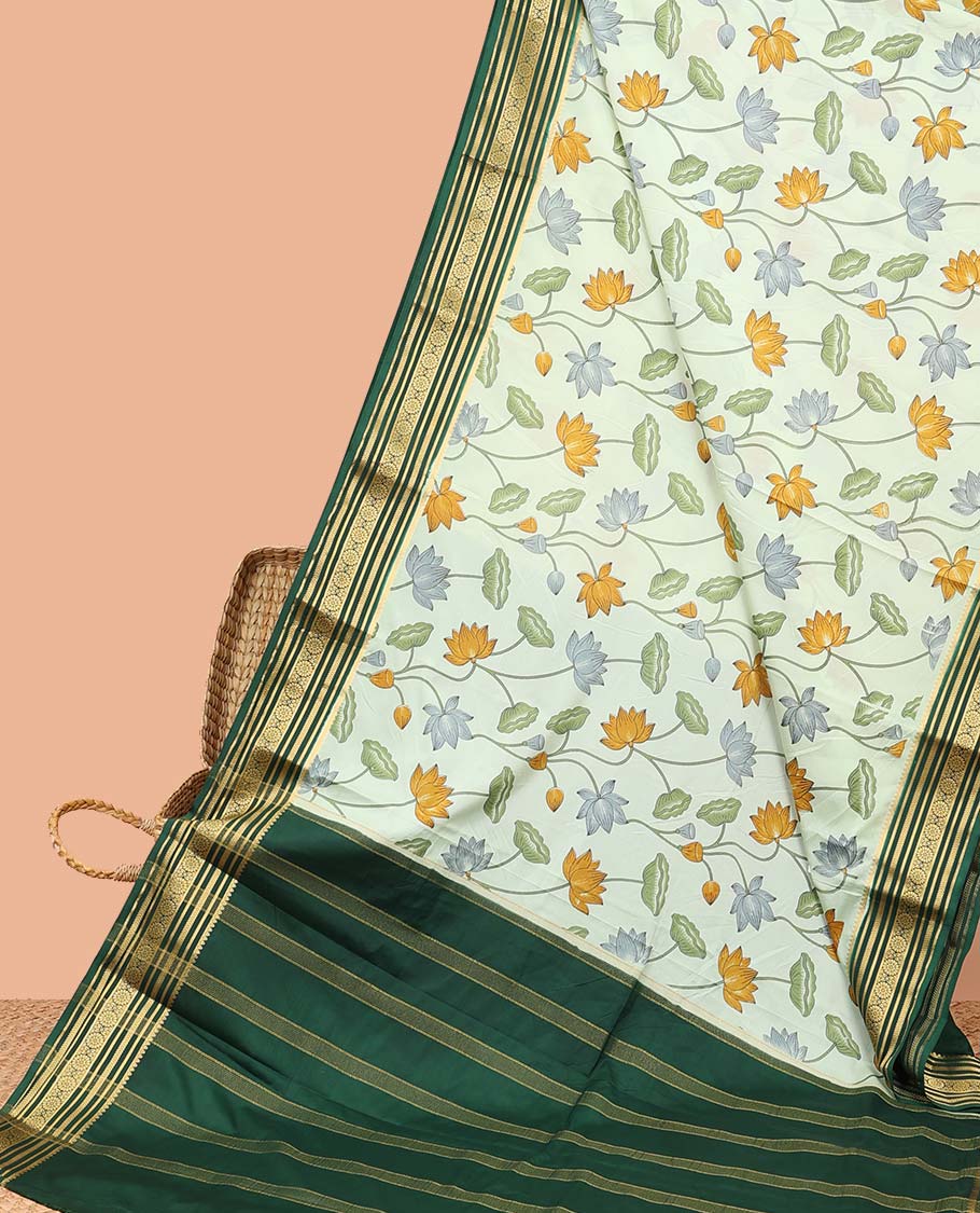 Green pichwai-style floral vine printed semi-banaras printed saree, contrast traditional design border & stripes of pallu