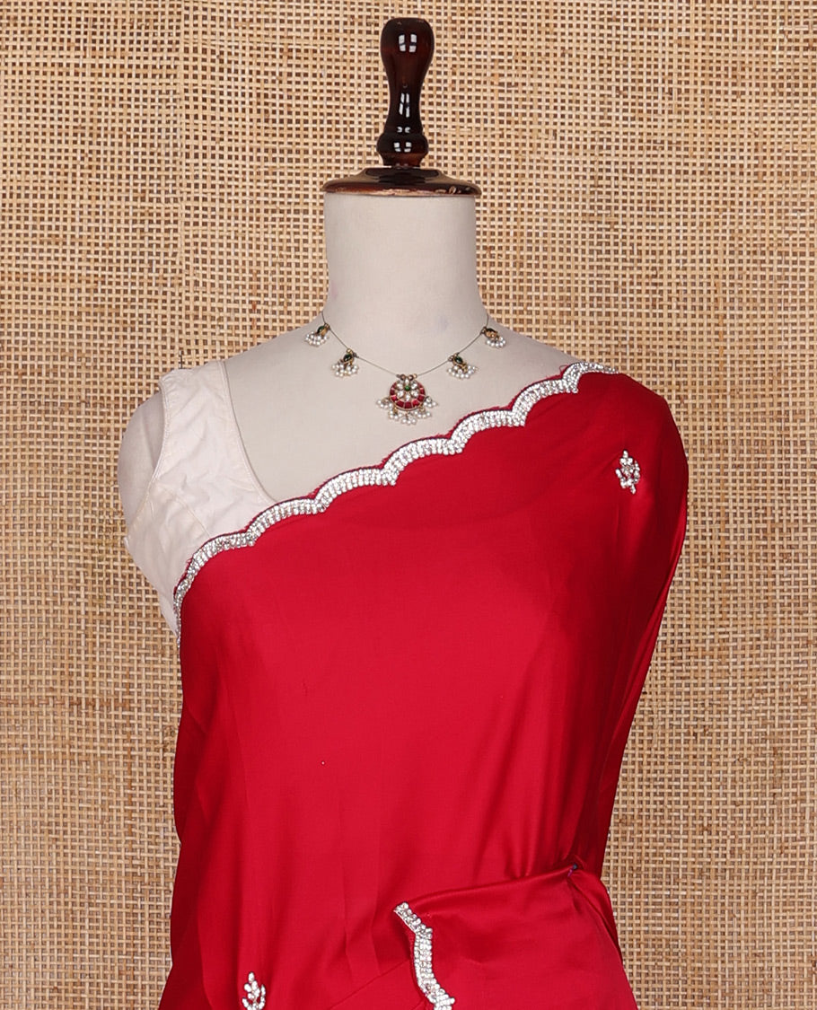 Red embroidered stone motifs designer saree with scallop crystal stone work border