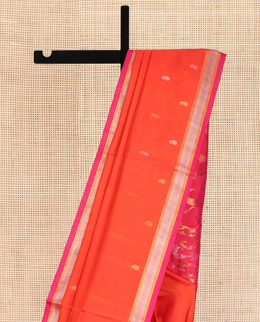 Orange Uppada Silk Saree, Decked Up with Paisley Buttas All Over Its Body, Complemented by Contrast Zari Bavanji Border, Pallu of Floral Designs, and Paired with a Contrast Blouse