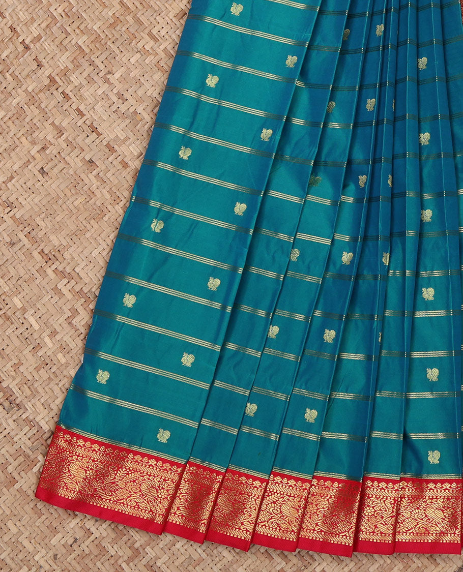 Blue Budget Silk Saree, Accentuated with Zari Buttas and Stripes All Over Its Body, Complemented by a Contrast Traditional Zari Design Border, Grand Jaal Pallu, and Paired with a Contrast Blouse