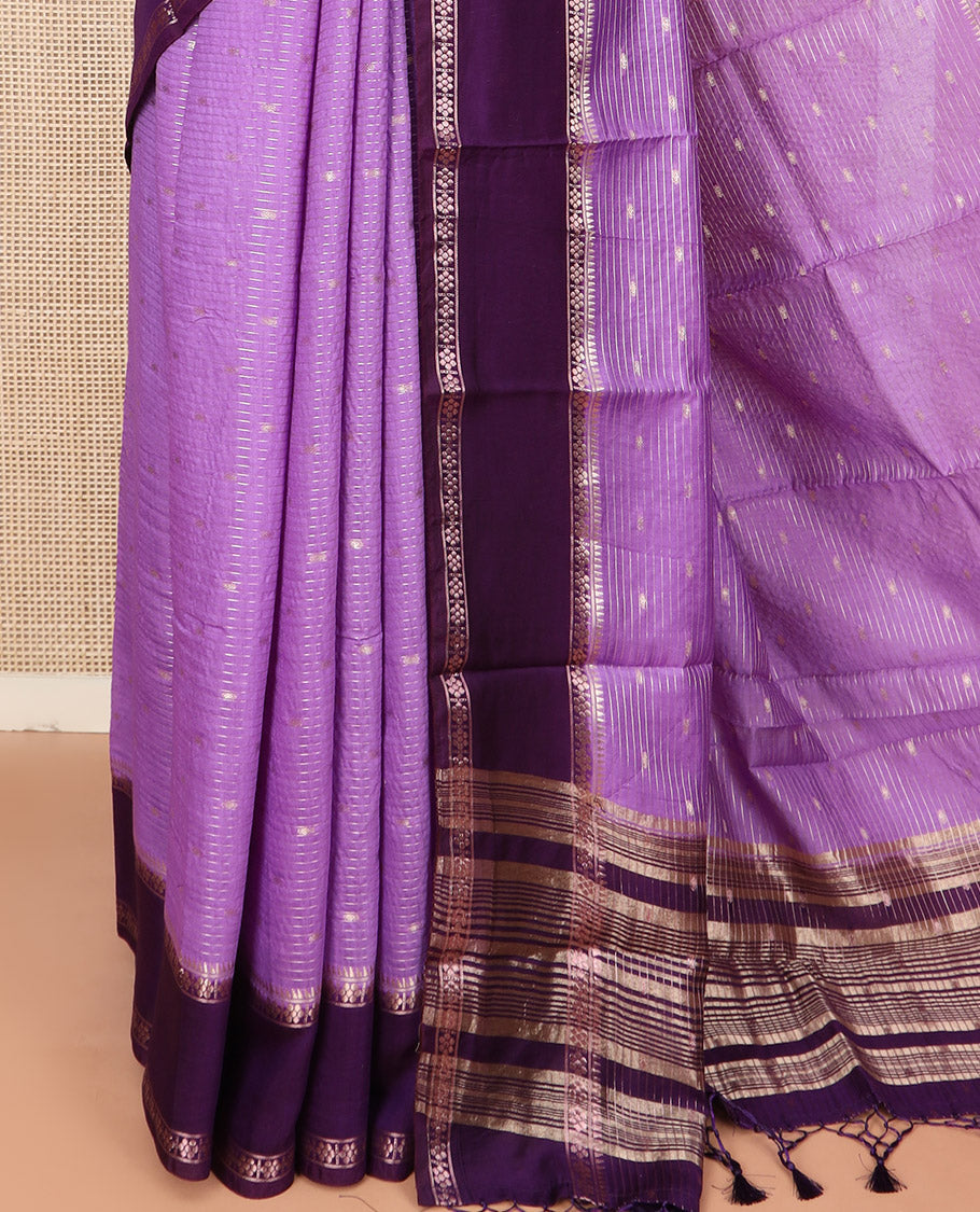Lavender Assam Silk Saree Woven with Zari Buttas and Stripes, Complemented by a Contrast Traditional Zari Design Border, a Captivating Pallu Featuring Zari Designs, and Paired with a Contrast Blouse