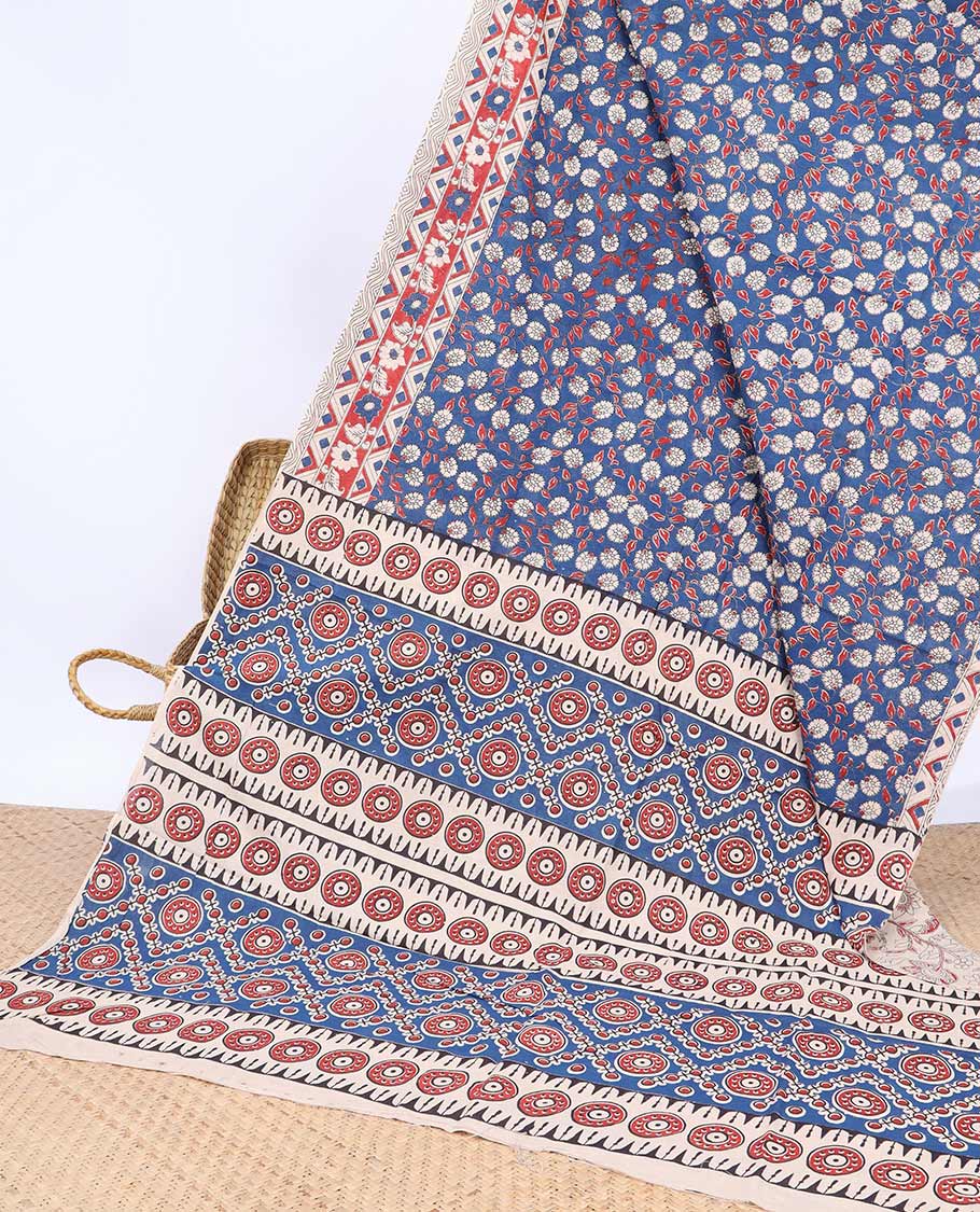 Blue floral vine machine-printed kalamkari cotton saree, contrast geometric border & intricate motifs pallu