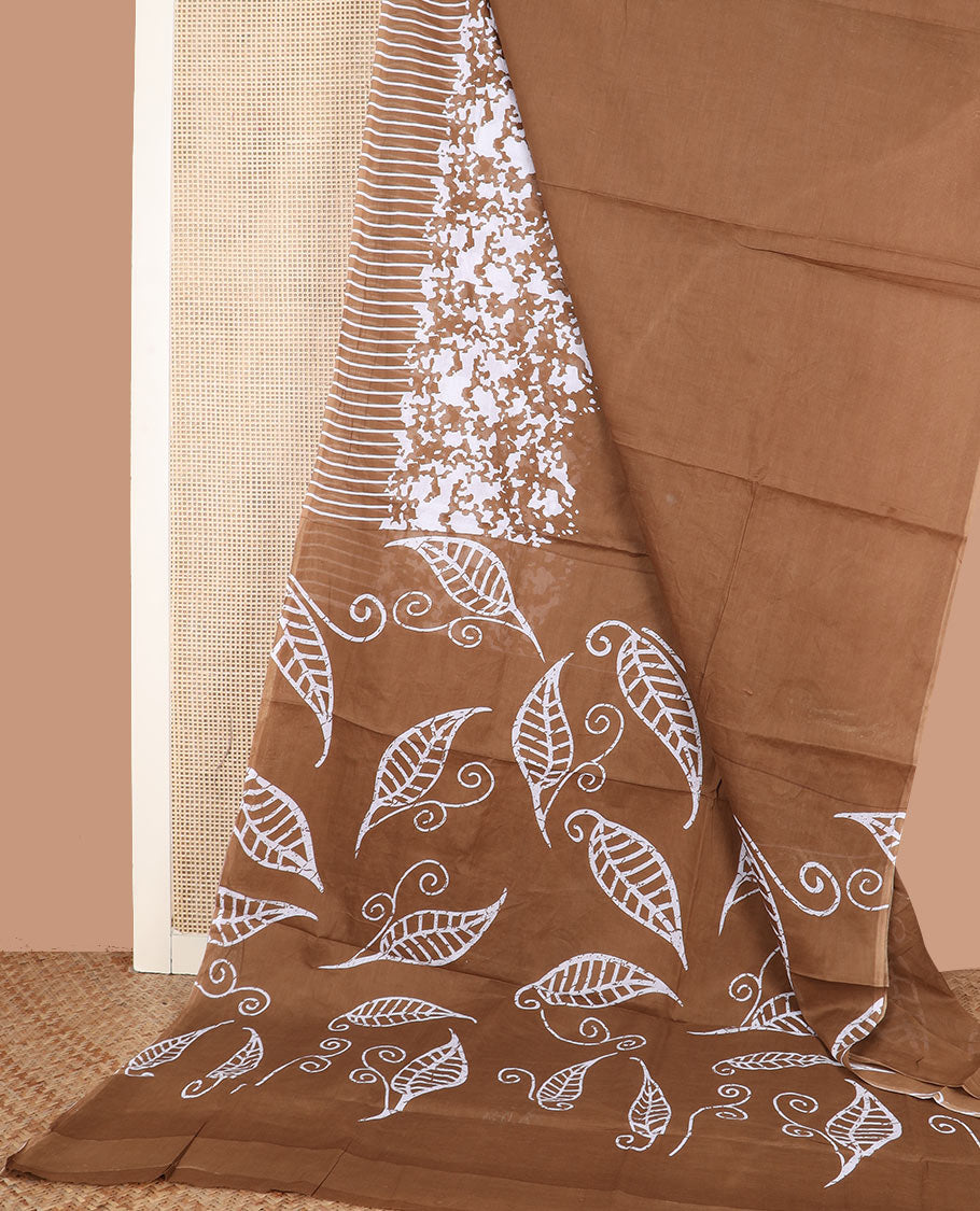 Brown plain and uniquely printed mixed cotton saree, self-border, and leaf motifs printed pallu
