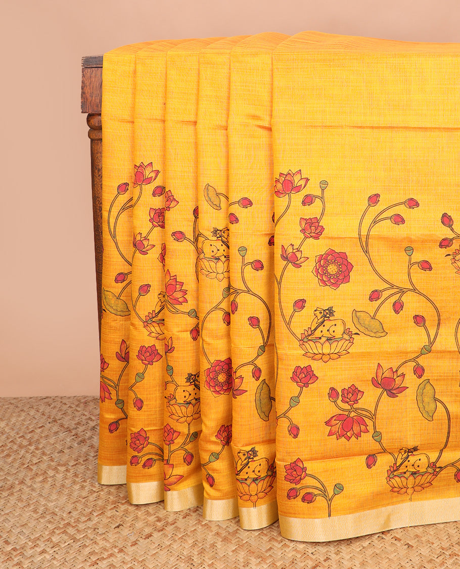 Orange floral vine and Pichwai cow printed chirala cotton saree, plain border, and contrast floral printed pallu