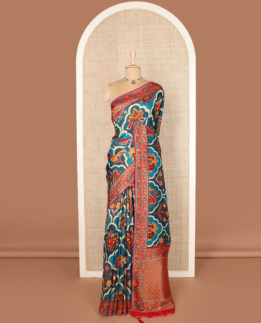 Blue ikkat design printed dola silk saree, contrast floral vine, and peacock border, and jaal pallu