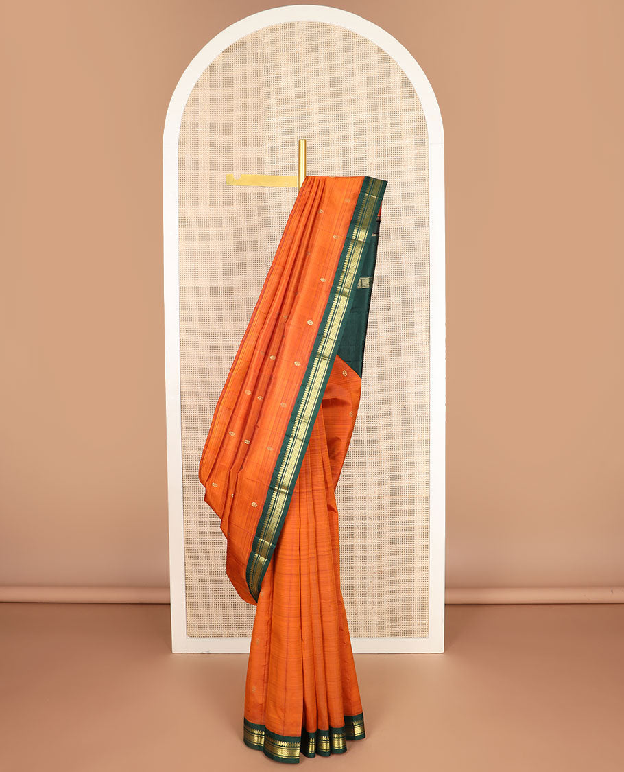 Orange zari buttas kanchipuram silksaree, contrast one-sided border of manga,banaras & mayil kann & zari design pallu