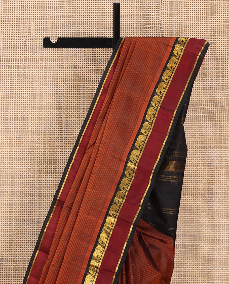 Rust Vazhaipoo Striped Kanchipuram Silk Saree, Complemented by a Contrast Rettai Pettu Border Featuring Yaanai, and Kathir Designs, Sparsely Zari Woven Pallu, and Paired with a Contrast Blouse