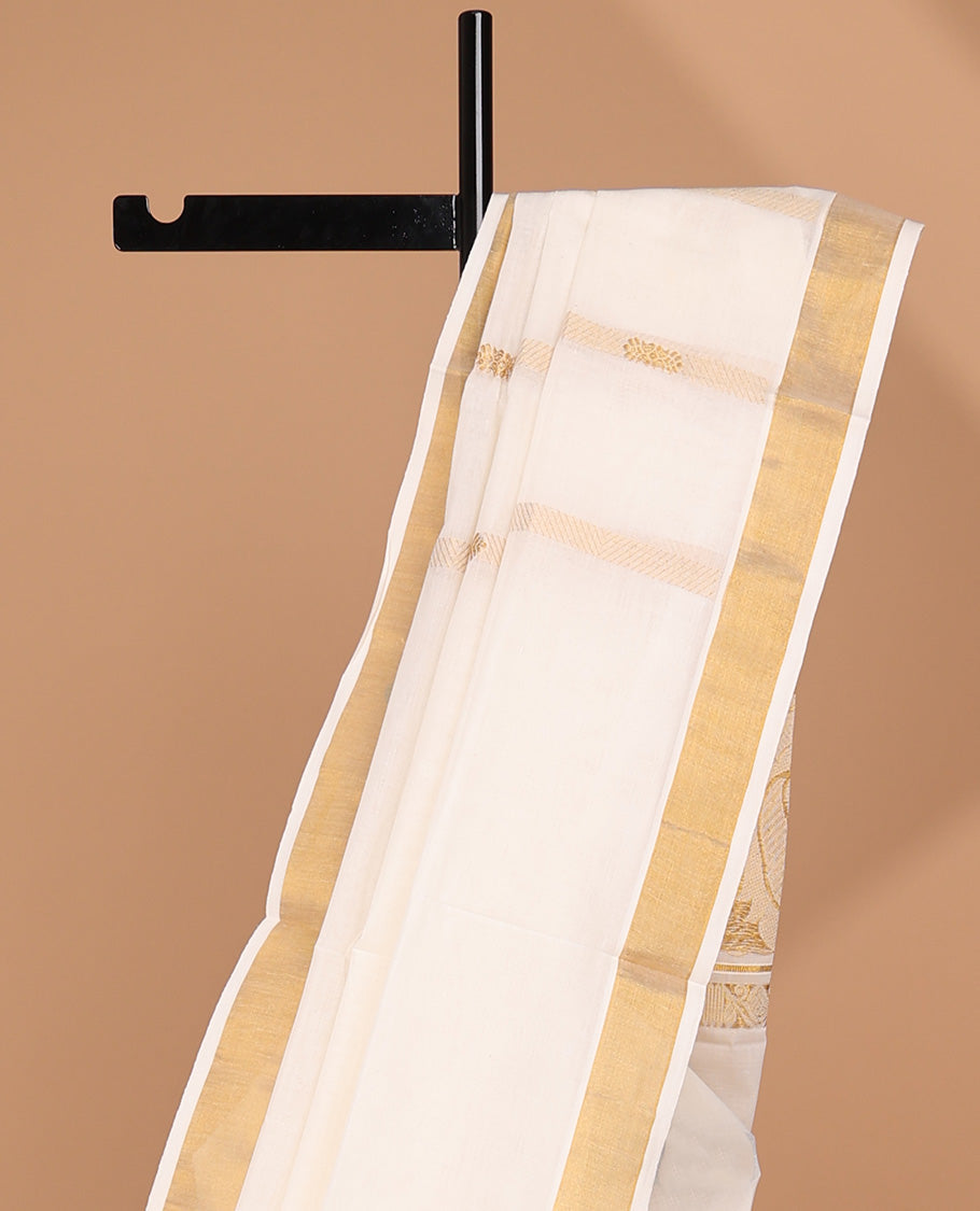 Cream kerala saree with zari stripes, zari border & pallu of peacock zari designs