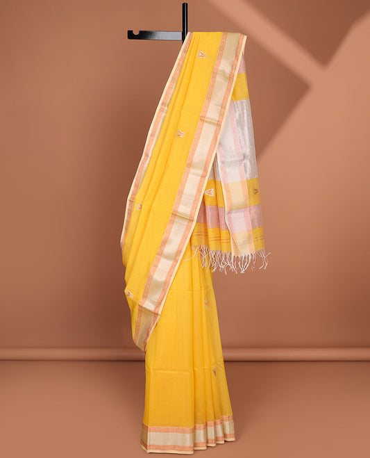 Yellow Maheshwari cotton saree with butterfly buttas, contrast chevron & diamond border & zari striped pallu