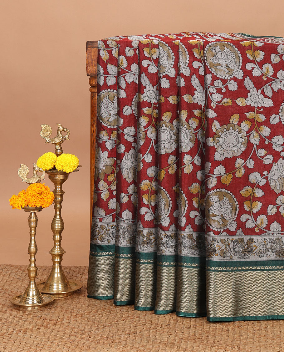 Maroon kalamkari-style round peocock & floral vine printed dola silk saree,contrast chevron zari border & peacock pallu
