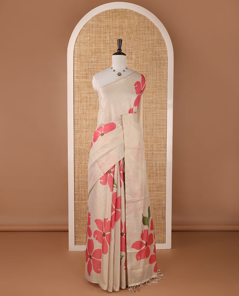 Borderless cream printed onam tissue silk saree features pink color five-petal flower & leaf motifs print, matching floral print blouse