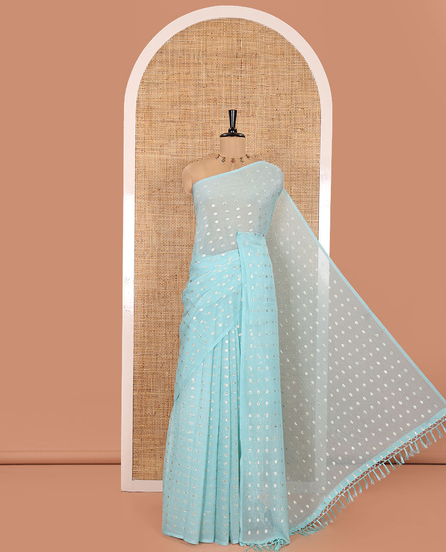 Borderless Light Blue Shimmer Saree, Gleamed up with Zari Buttas All Over Its Body, Pallu Mirrors the Same Buttas, and Comes Without a Blouse