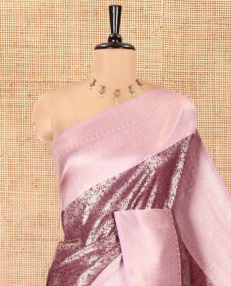 Purple Kanchi Silk Saree, Mesmerized with Floral Jacquard Design on Its Body, Complemented by a Contrast Traditional Zari Design Border, Sparsely Woven Pallu, and Paired with a Contrast Blouse