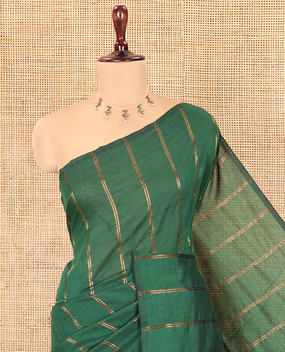 Borderless Peacock Green Khadi Cotton Saree Features Double Stripes, a Self-Pallu of Tassels, and a Matching Blouse